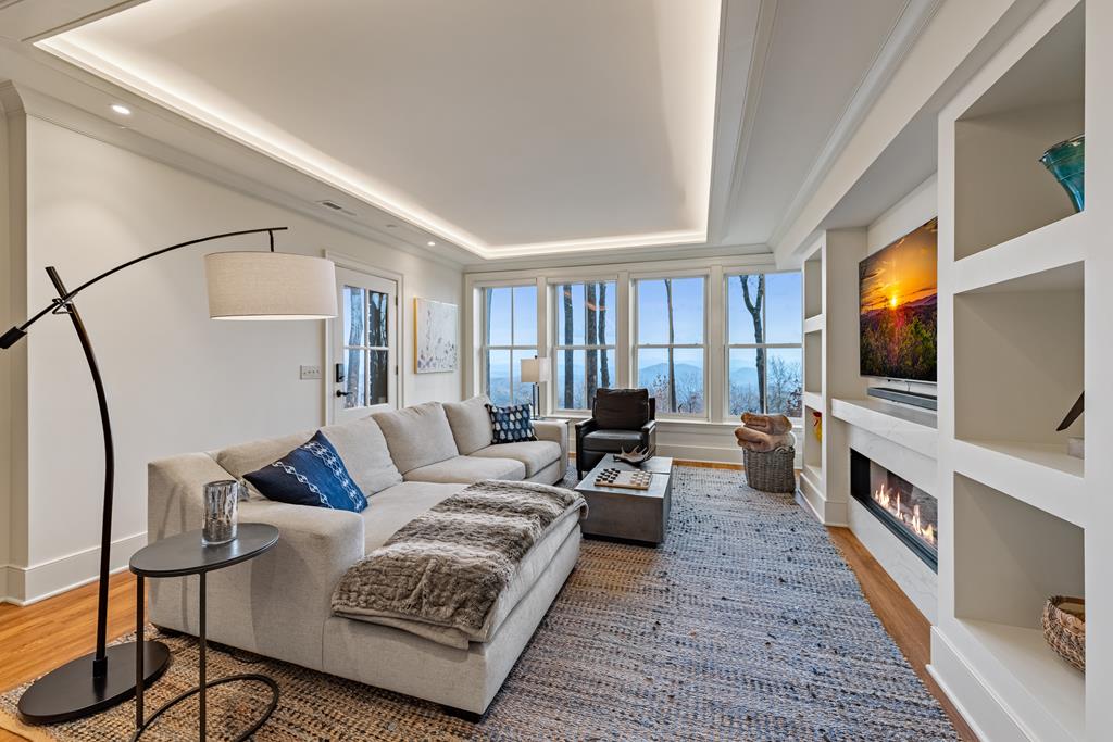 1115 Outlook Road Murphy, NC 28906 - Photo 41 of 60 a living room with furniture and a flat screen tv