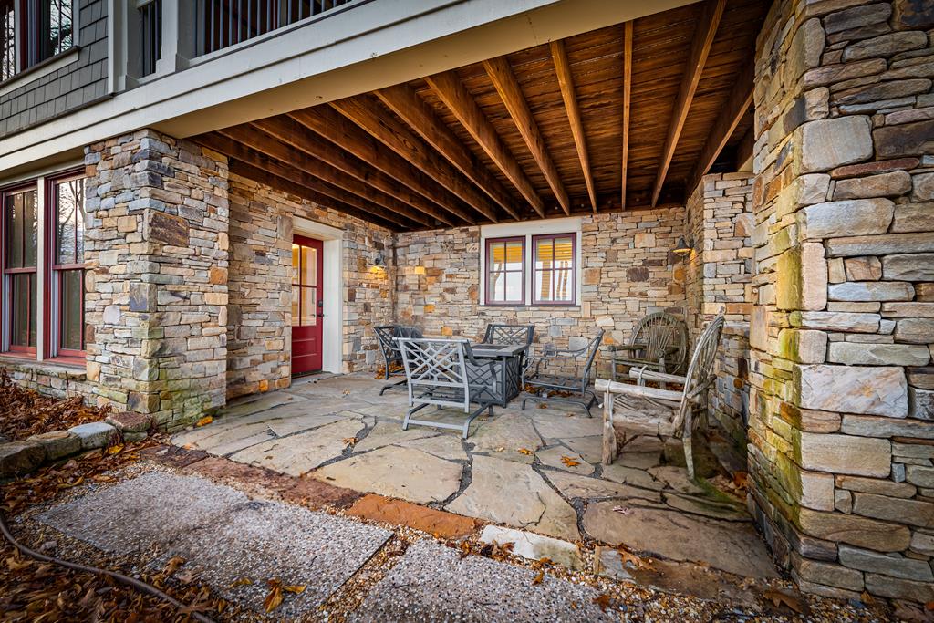 1115 Outlook Road Murphy, NC 28906 - Photo 47 of 60 a view of backyard with table and chairs and potted plants