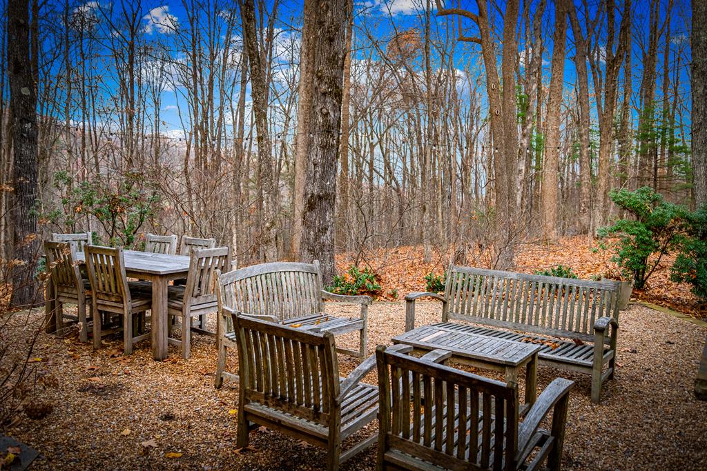1115 Outlook Road Murphy, NC 28906 - Photo 52 of 60 a view of a patio with a table and chairs