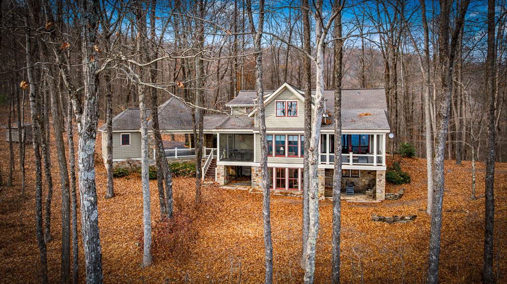 1115 Outlook Road Murphy, NC 28906 - Photo 57 of 60 a view of a large building with large tree and wooden fence