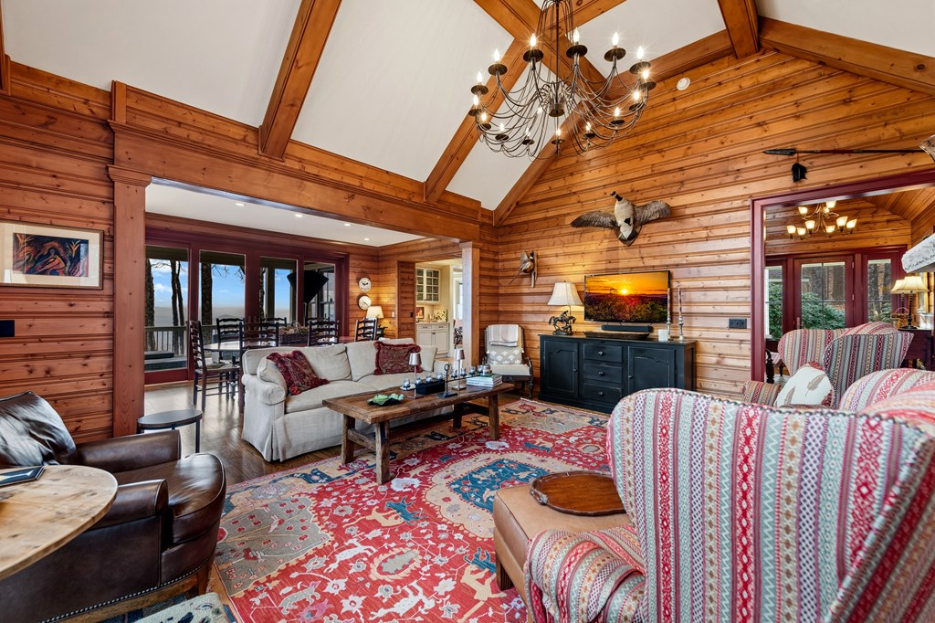 1115 Outlook Road Murphy, NC 28906 - Photo 6 of 60 a living room with furniture and a flat screen tv