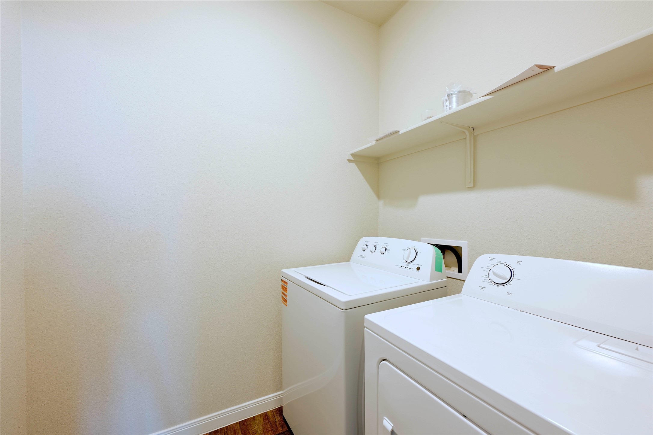 14008 Levy Pflugerville, TX 78660 - Photo 12 of 15 Functional laundry space featuring a washer and dryer for everyday convenience.