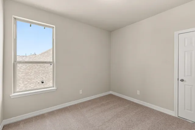 an empty room with a window