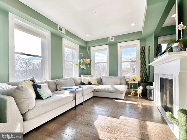 a bedroom with a large bed and a walk in closet