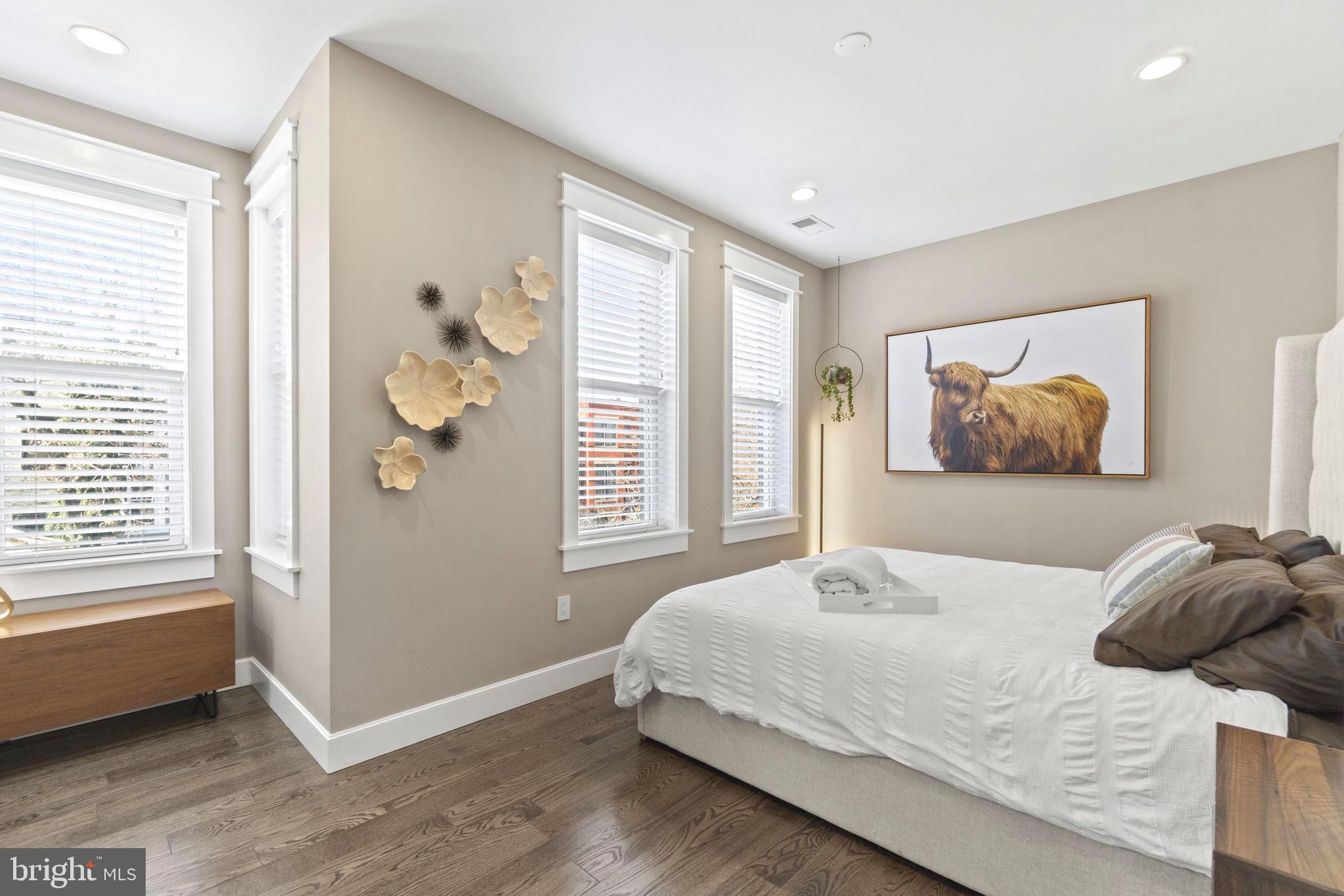 85 R Street Northwest Washington, DC 20001 - Photo 16 of 29 a bedroom with a bed and a window