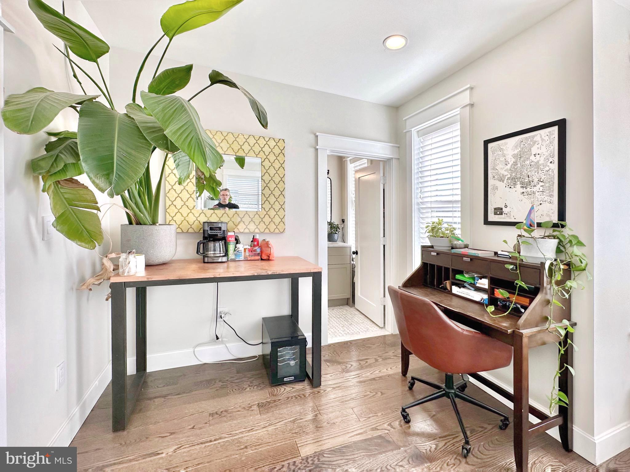 85 R Street Northwest Washington, DC 20001 - Photo 21 of 29 a living room with furniture and a window