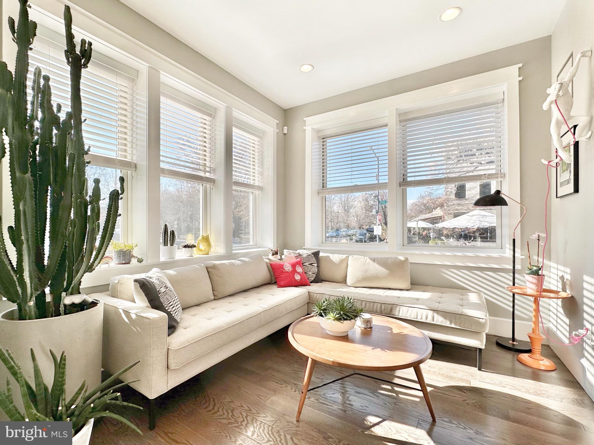 85 R Street Northwest Washington, DC 20001 - Photo 5 of 29 a living room with furniture and a large window