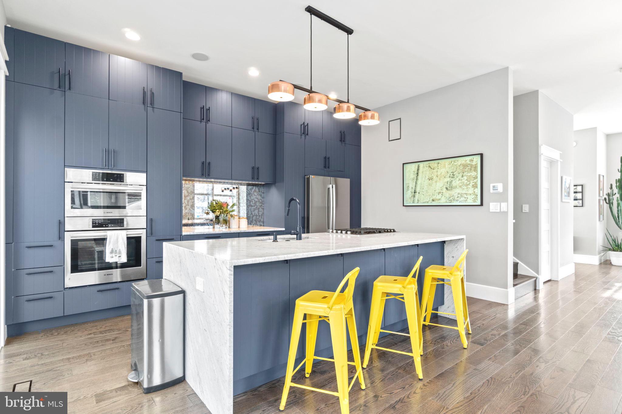 85 R Street Northwest Washington, DC 20001 - Photo 9 of 29 a view of a dining room with furniture and wooden floor