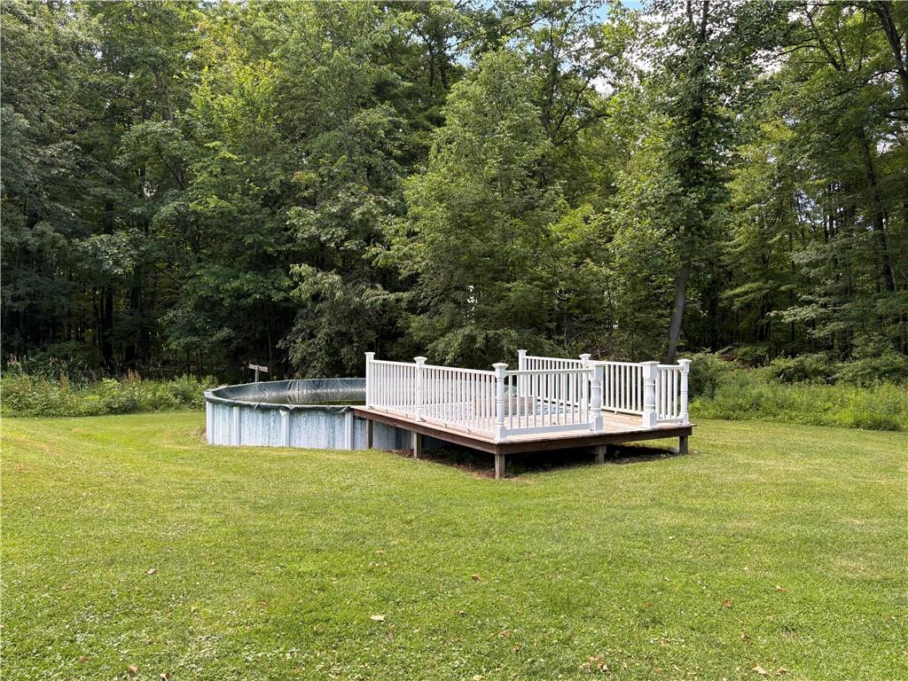 320 Cherry Hill Road Greenville, PA 16125 - Photo 35 of 38 a view of a wooden deck and a yard with swimming pool