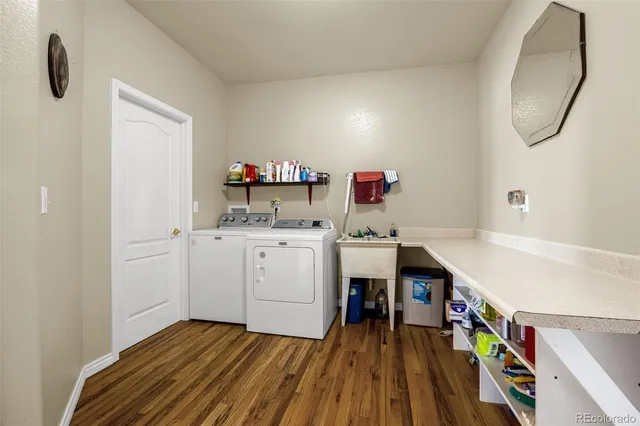 a storage room with washer and dryer