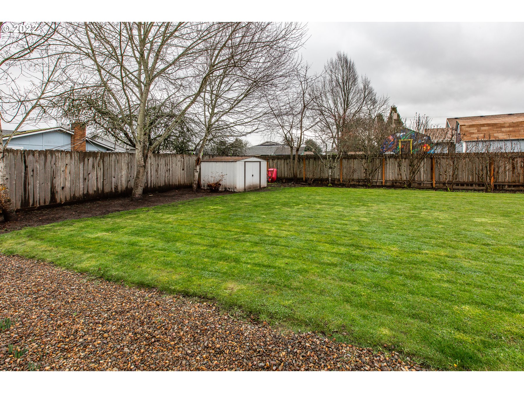2265 10th Street Springfield, OR 97477 - Photo 19 of 23 a view of a yard
