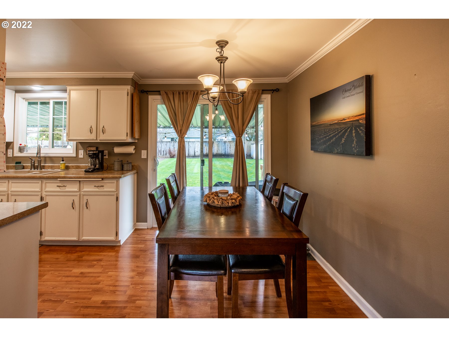 2265 10th Street Springfield, OR 97477 - Photo 7 of 23 a view of a dining room with furniture window and outside view