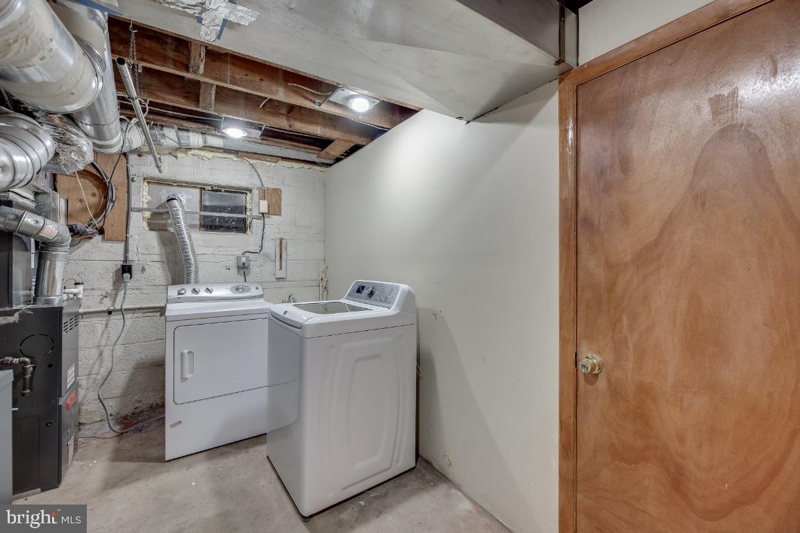611 Forest Glen Road Silver Spring, MD 20901 - Photo 33 of 36 Basement laundry and storage area