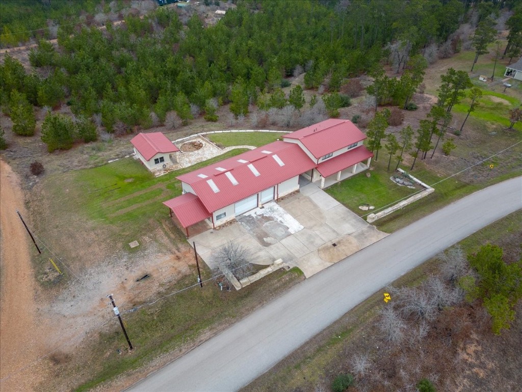 250 Cottle Town Road Smithville, TX 78957 - Photo 1 of 1 an aerial view of a house with outdoor space