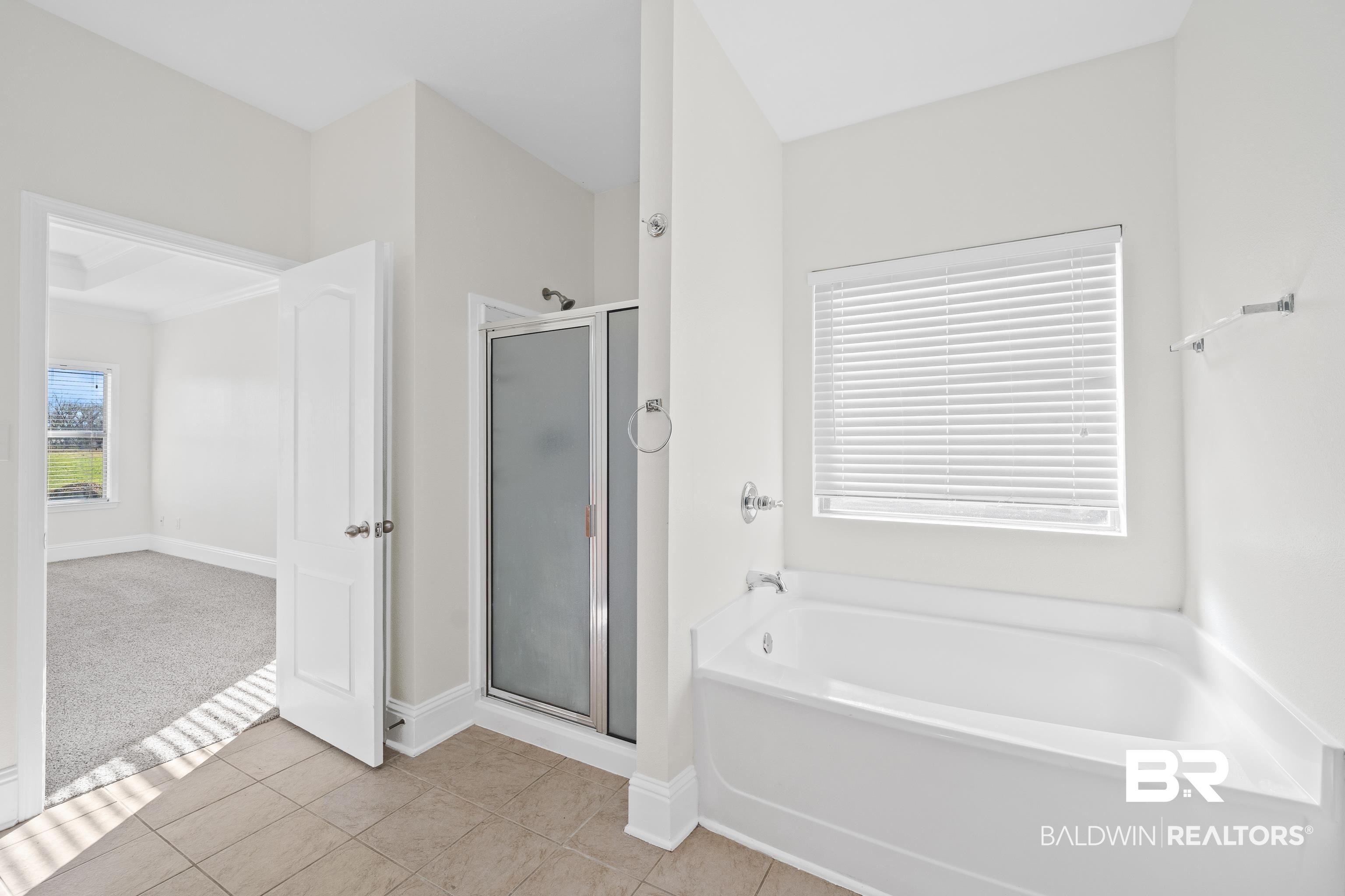 25350 Spindle Lane Daphne, AL 36526 - Photo 20 of 32 Bathroom with tile patterned flooring and shower with separate bathtub