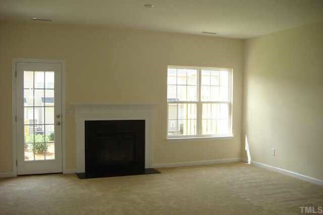 3527 Oneonta Avenue Raleigh, NC 27604 - Photo 2 of 6 an empty room with windows