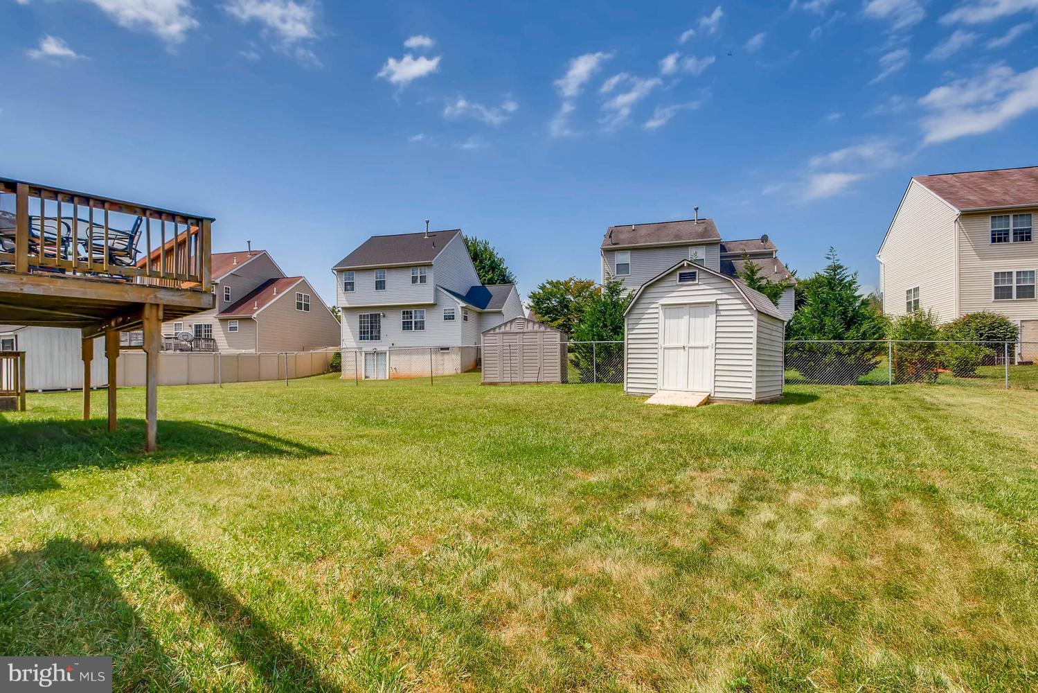 4628 Old Court Road Baltimore, MD 21208 - Photo 26 of 28 a front view of a house with garden