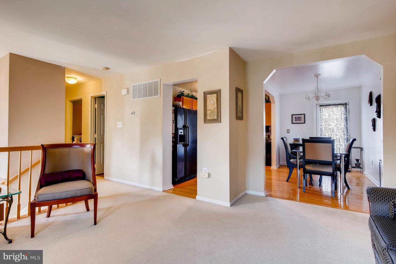 4628 Old Court Road Baltimore, MD 21208 - Photo 7 of 28 a view of a livingroom with furniture and a chair
