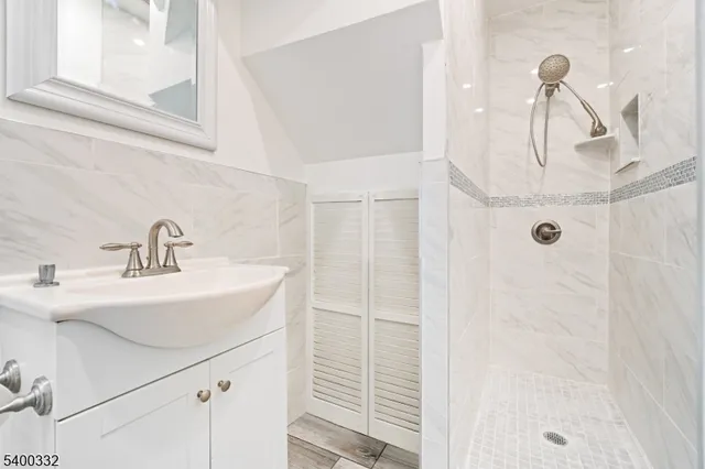 a bathroom with a sink and a shower