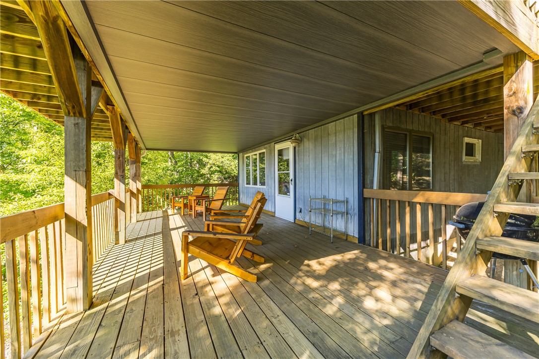 198 East Lake Road Middlesex, NY 14544 - Photo 30 of 50 LOWER LEVEL DECK WITH AMAZING LAKE VIEWS