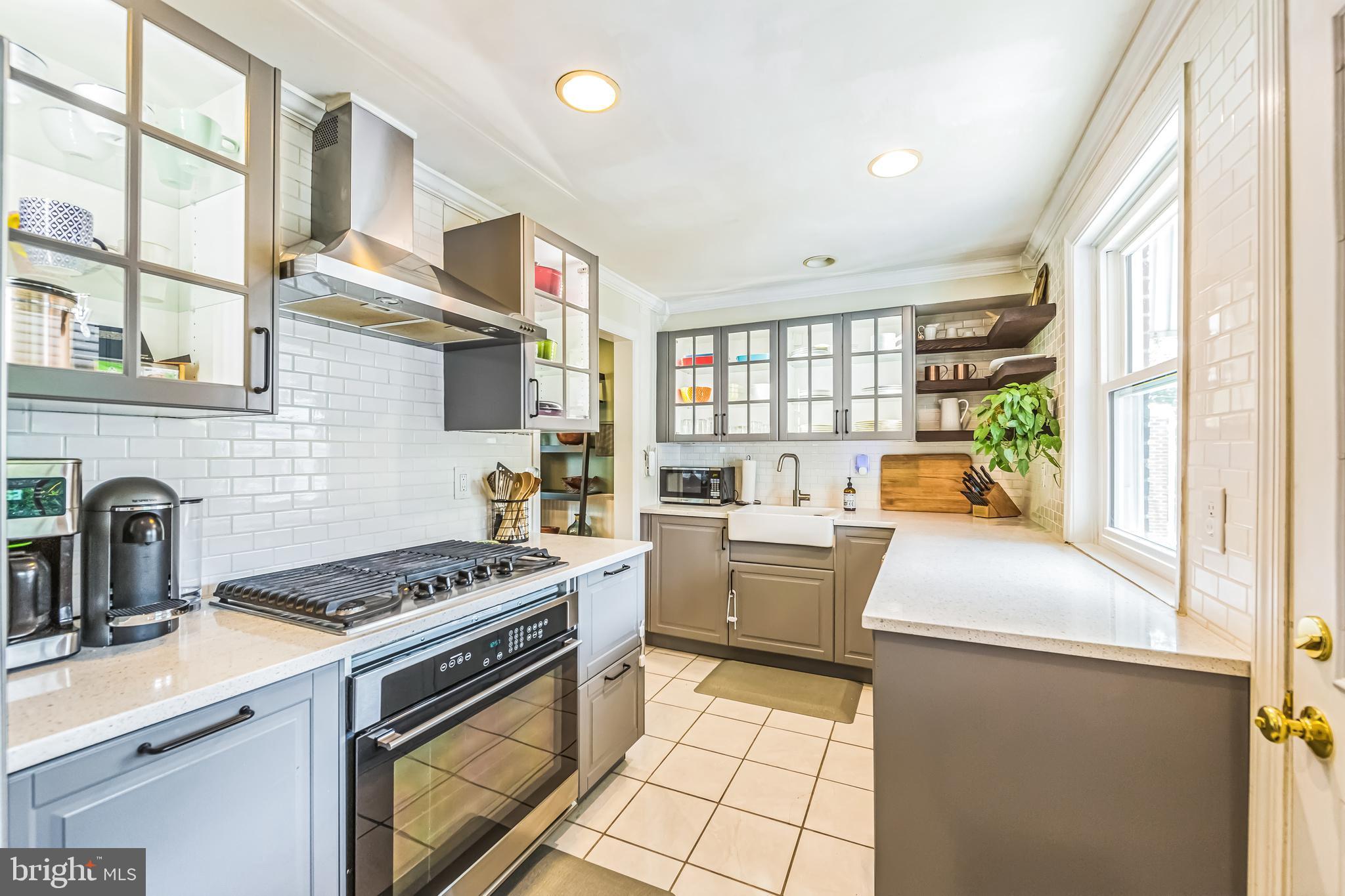 111 East Manoa Road Havertown, PA 19083 - Photo 6 of 18 a kitchen that has a sink and a stove