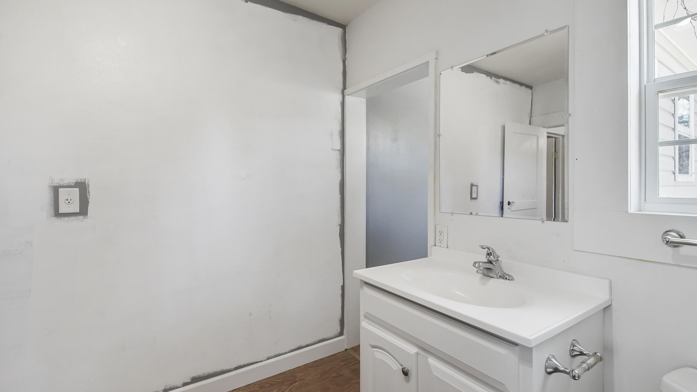 36 Williams Road DeFuniak Springs, FL 32433 - Photo 23 of 40 a bathroom with a sink toilet and mirror