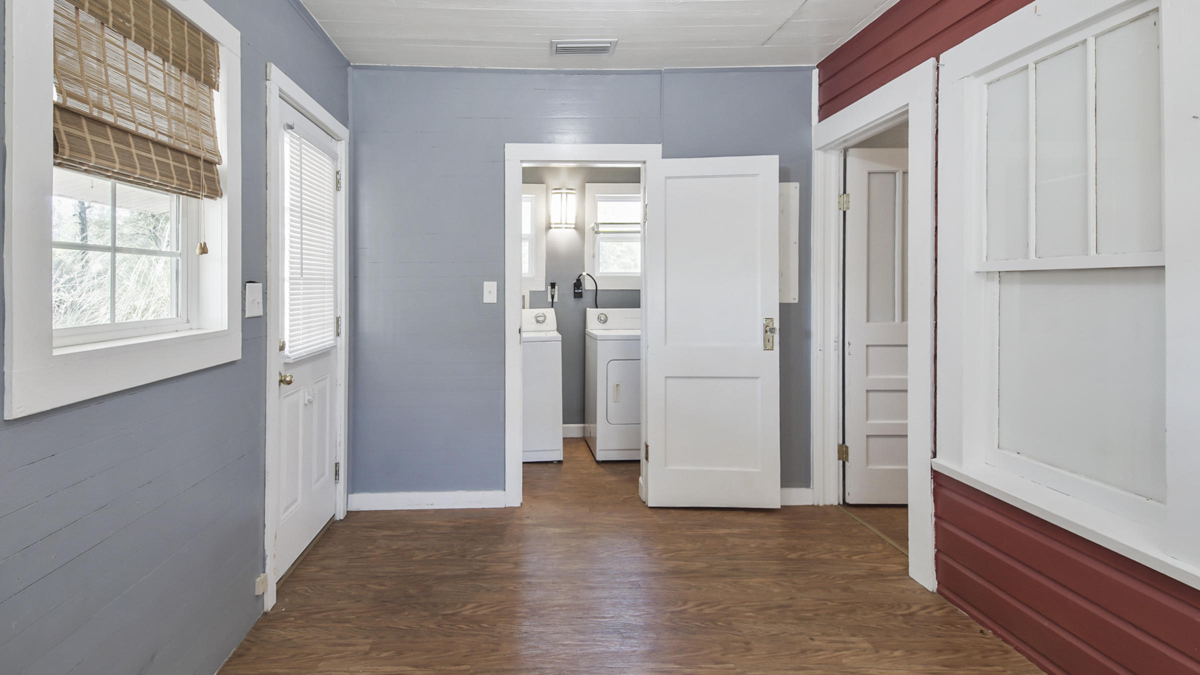 36 Williams Road DeFuniak Springs, FL 32433 - Photo 27 of 40 a view of an empty room with wooden floor and a window