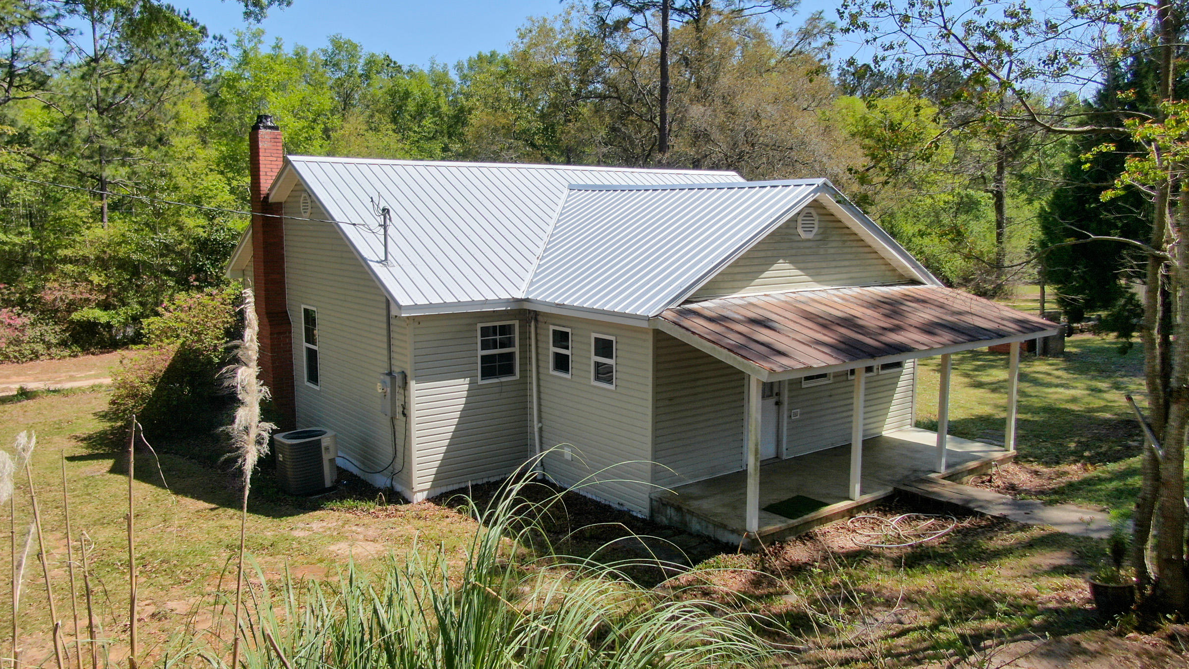 36 Williams Road DeFuniak Springs, FL 32433 - Photo 29 of 40 a view of house with backyard and trees