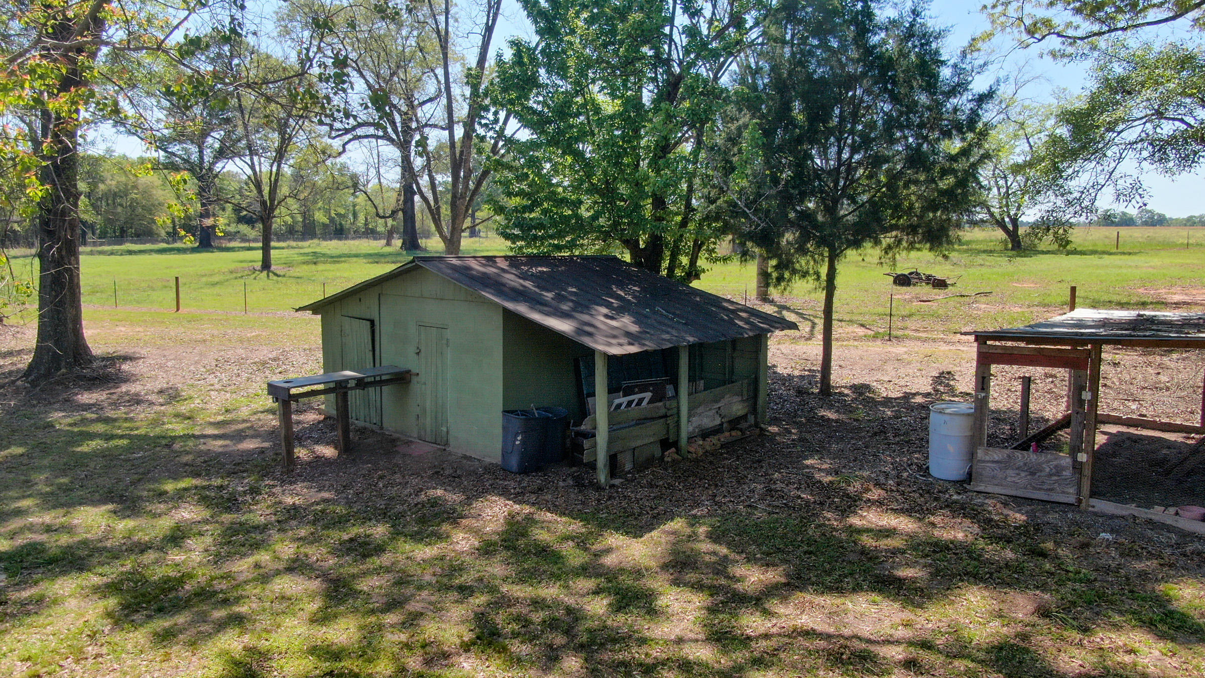 36 Williams Road DeFuniak Springs, FL 32433 - Photo 35 of 40 a view of a house with garden and sitting area