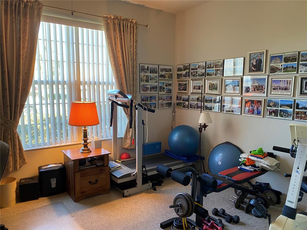 8464 Southwest 82nd Circle Ocala, FL 34481 - Photo 24 of 47 a room with a workspace and a window