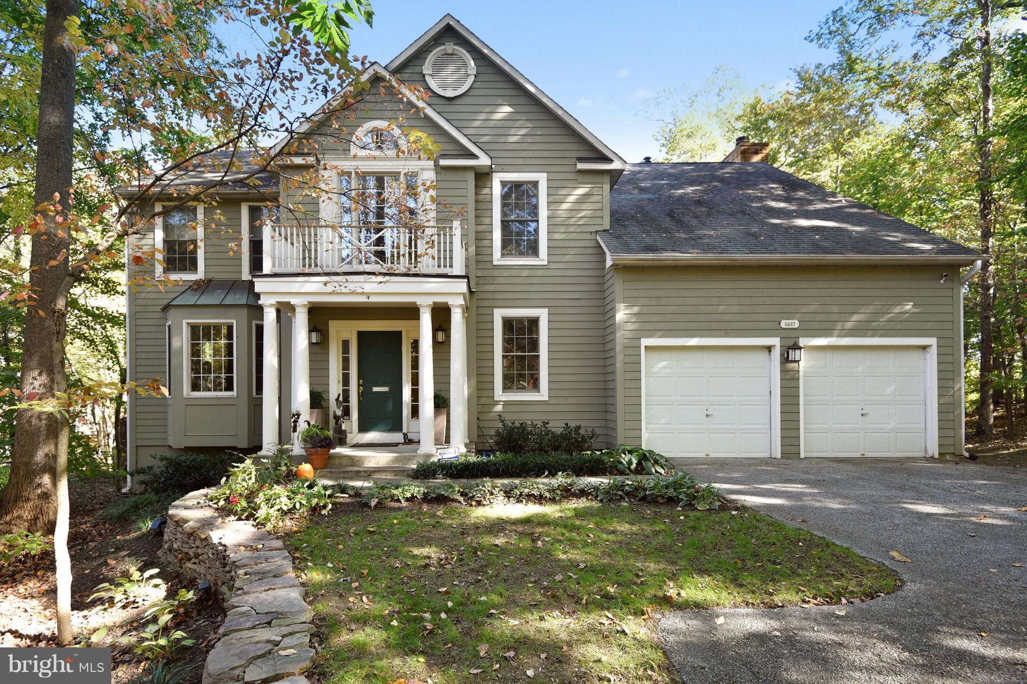 5607 South Bend Road Baltimore, MD 21209 - Photo 1 of 30 a front view of a house with garden