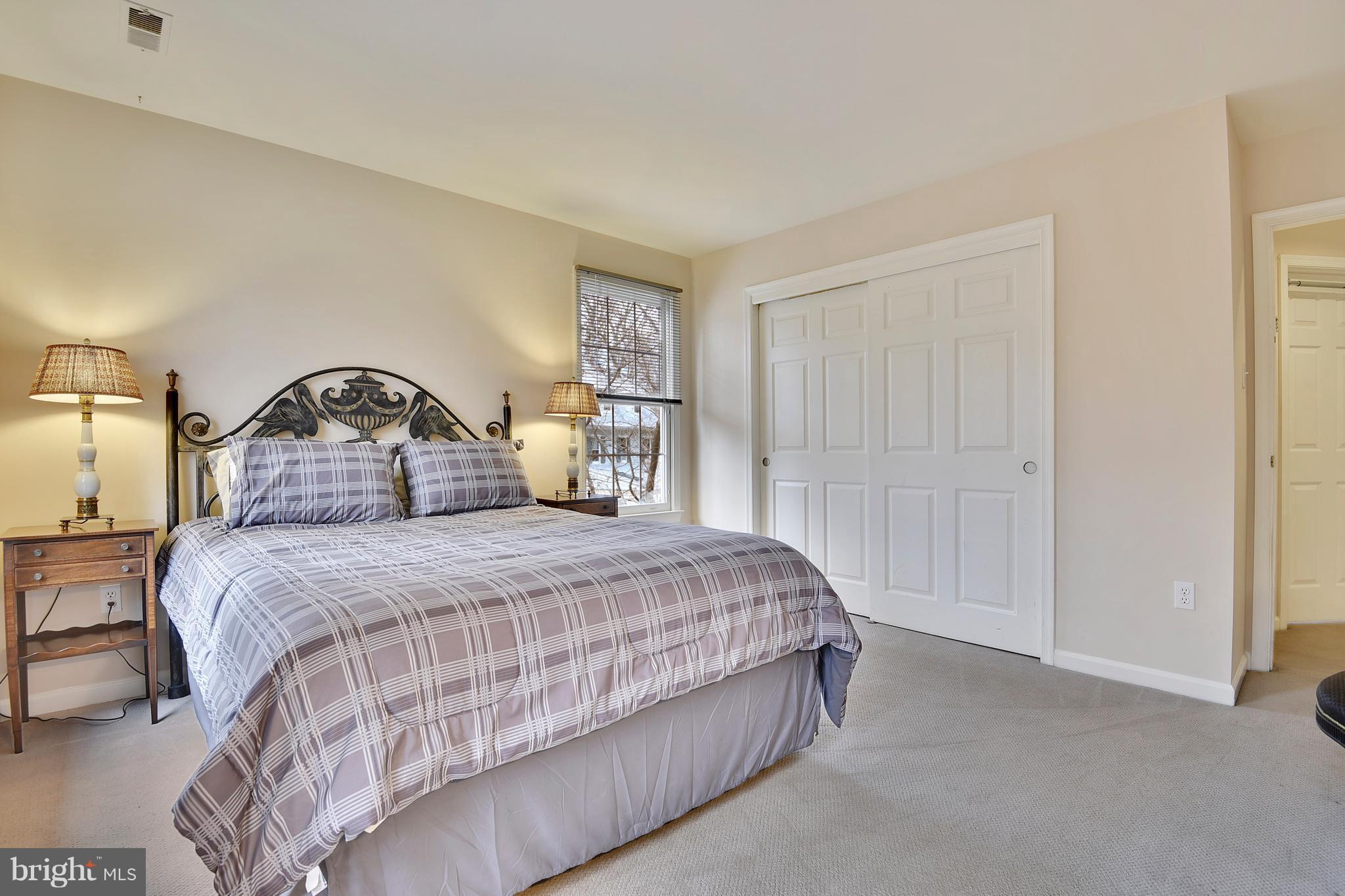 5607 South Bend Road Baltimore, MD 21209 - Photo 16 of 30 a bedroom with a bed and a closet