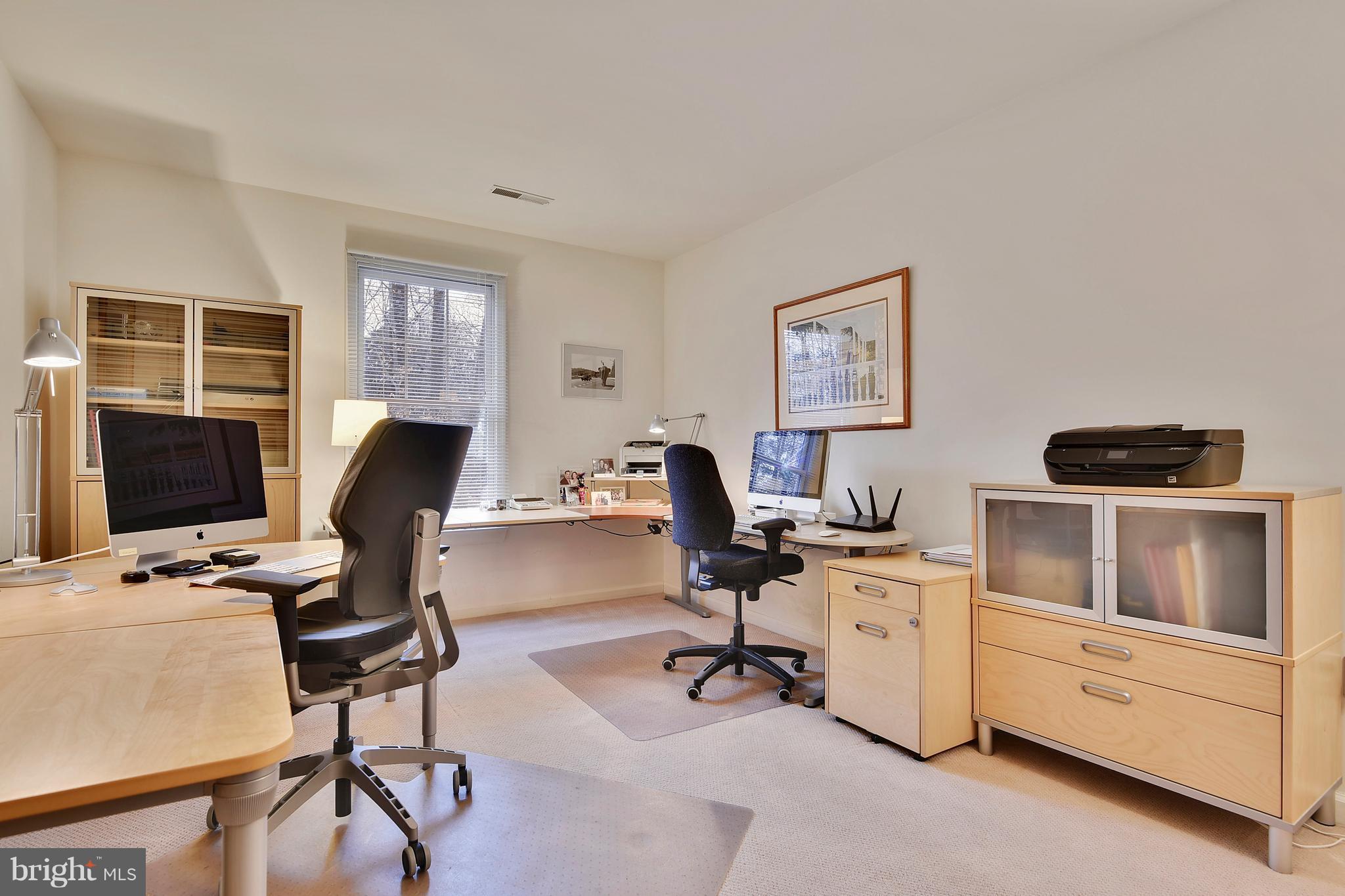 5607 South Bend Road Baltimore, MD 21209 - Photo 18 of 30 a view of a workspace with furniture and a window