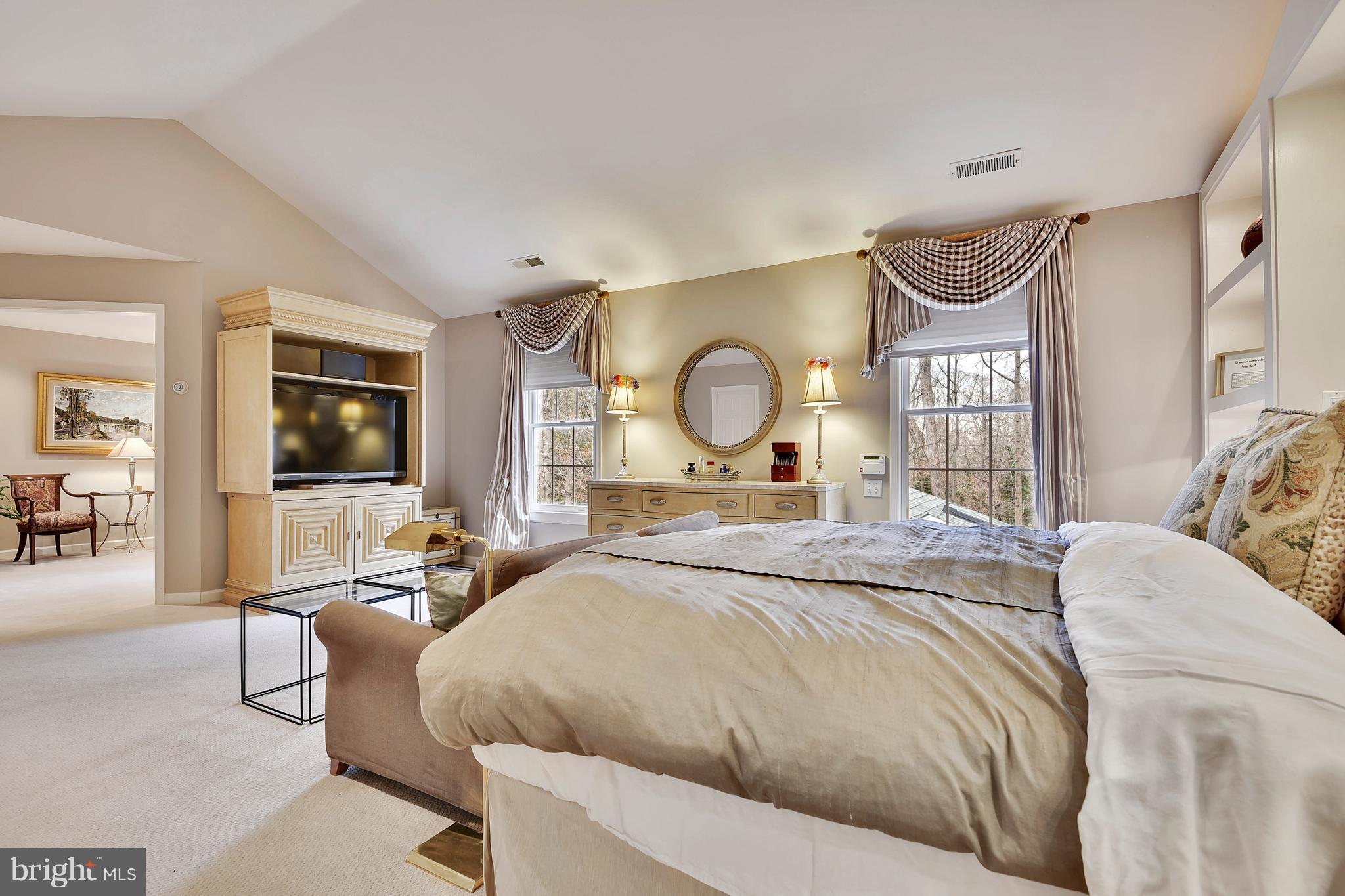 5607 South Bend Road Baltimore, MD 21209 - Photo 21 of 30 a bedroom with a bed couch and a window