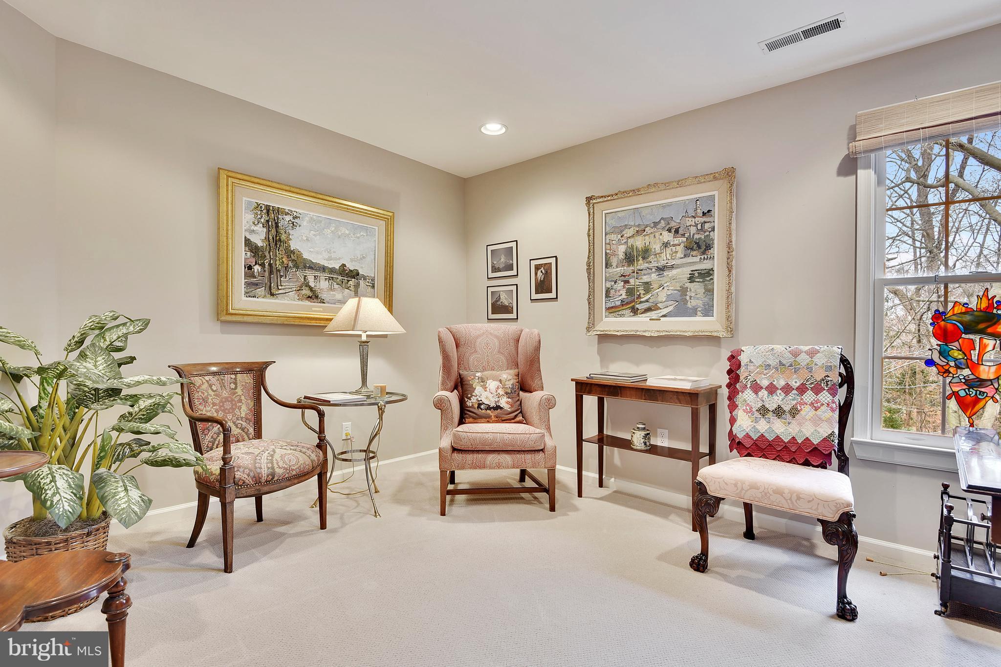 5607 South Bend Road Baltimore, MD 21209 - Photo 22 of 30 a bedroom with furniture and a painting on the wall