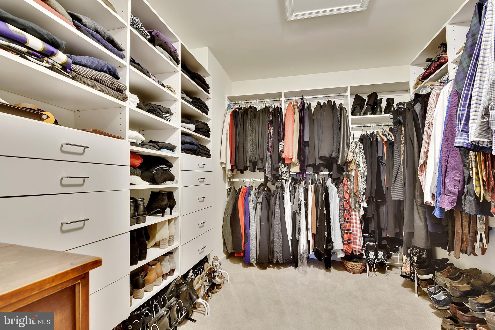 5607 South Bend Road Baltimore, MD 21209 - Photo 24 of 30 a view of walk in closet with clothes