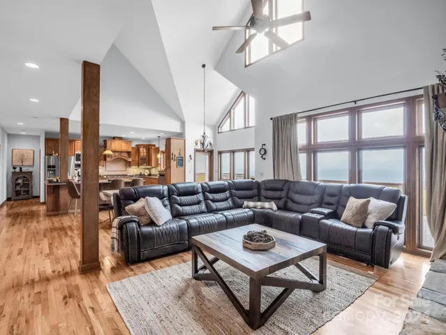 a living room with furniture and a rug
