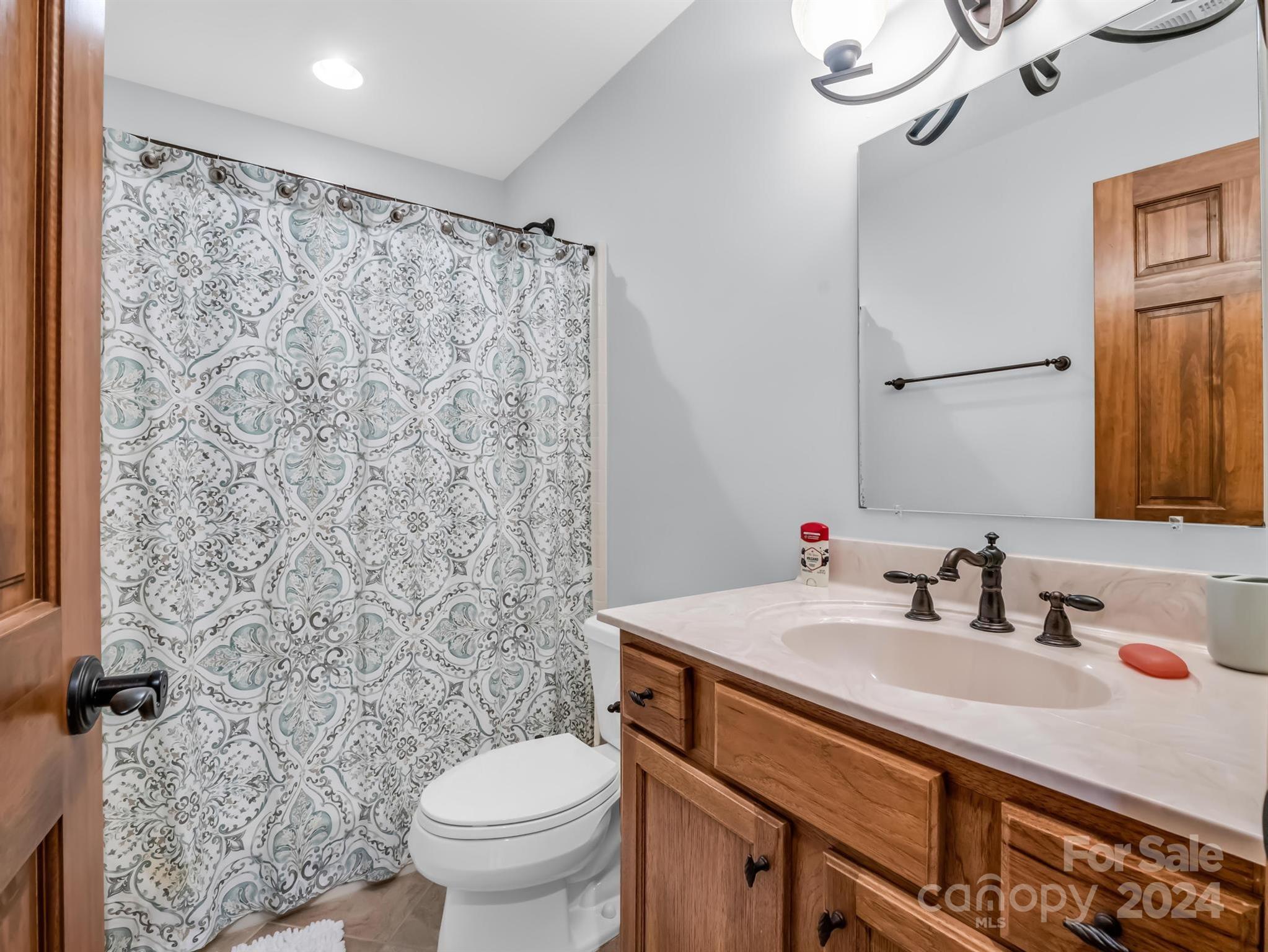 428 Devils Hole Road, Unit 14 Rosman, NC 28772 - Photo 29 of 47 a bathroom with a sink toilet and shower