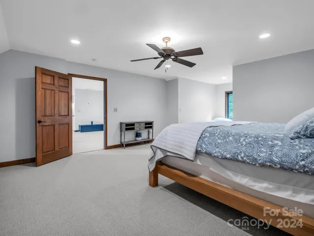 a bathroom with a shower and a toilet