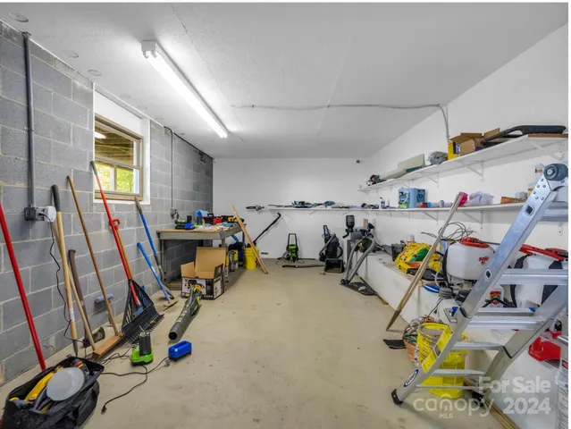 a balcony with trees in back