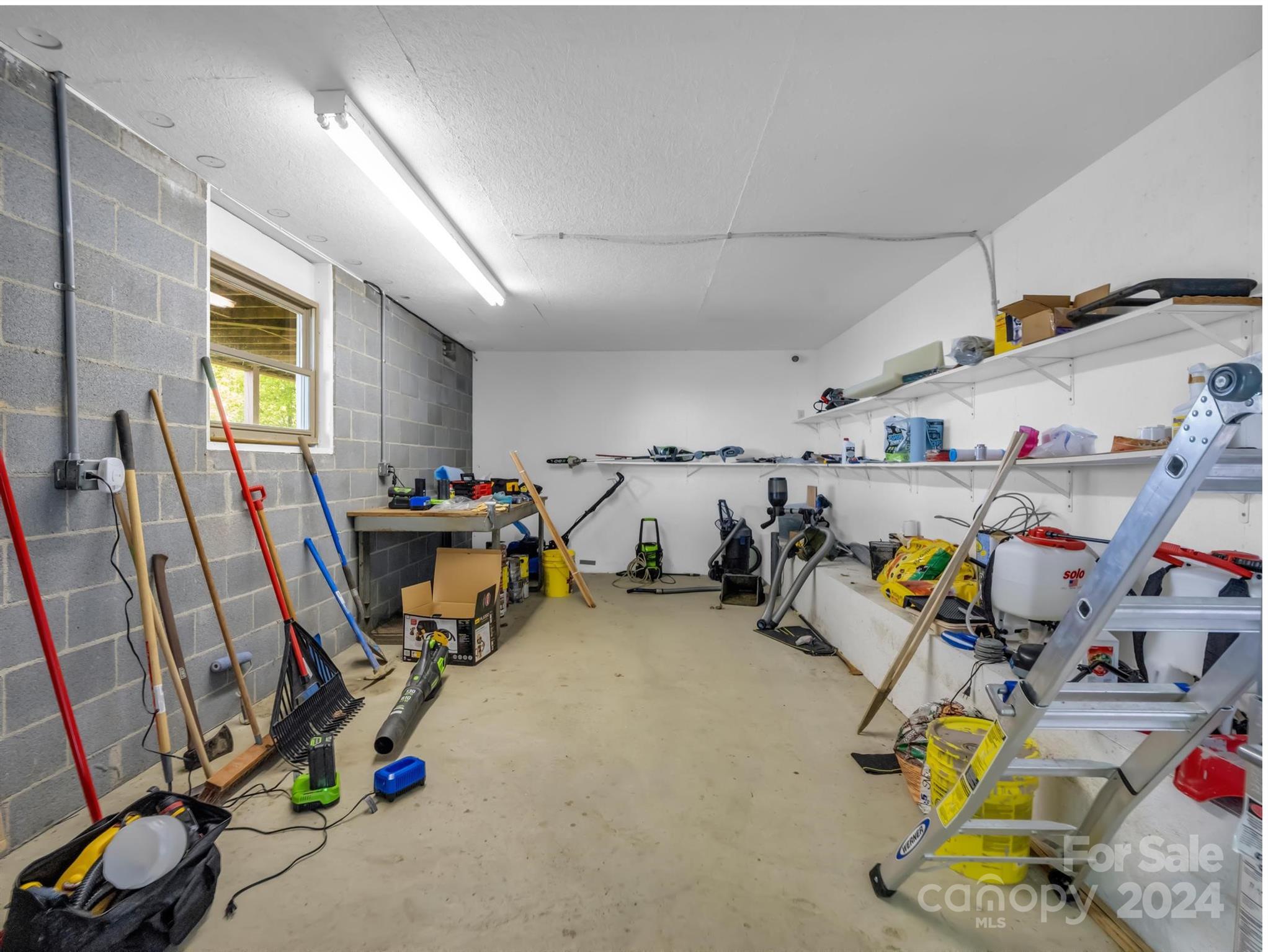 428 Devils Hole Road, Unit 14 Rosman, NC 28772 - Photo 37 of 47 a view of a room with gym equipment