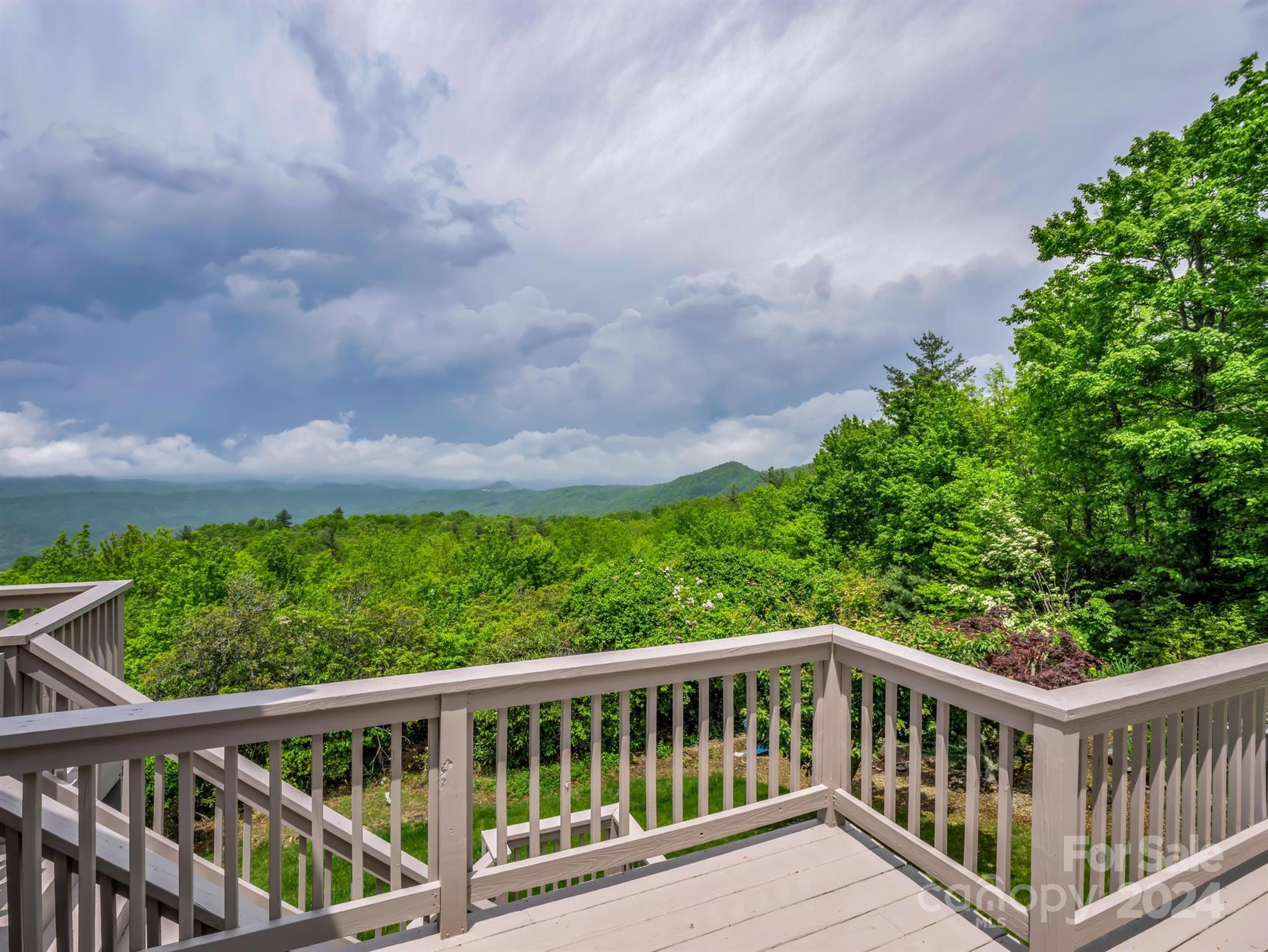 428 Devils Hole Road, Unit 14 Rosman, NC 28772 - Photo 39 of 47 a balcony with trees in back