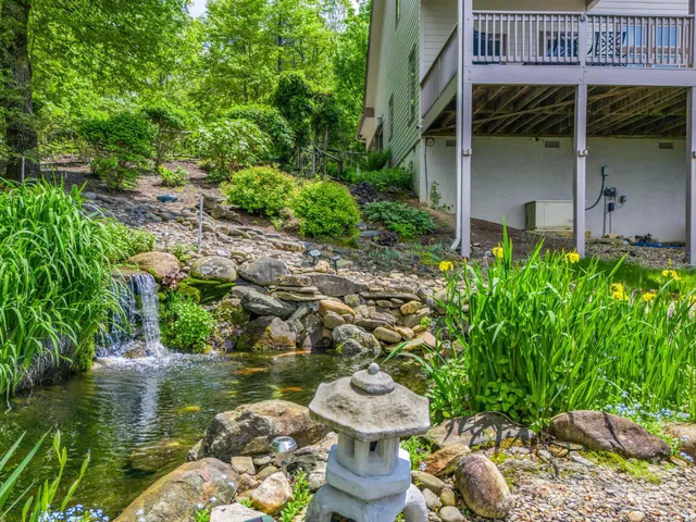 a view of a balcony with wooden fence