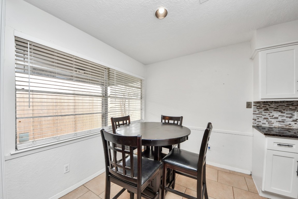 1415 Parry-Sound Pasadena, TX 77504 - Photo 12 of 39 a view of a dining room with furniture and window