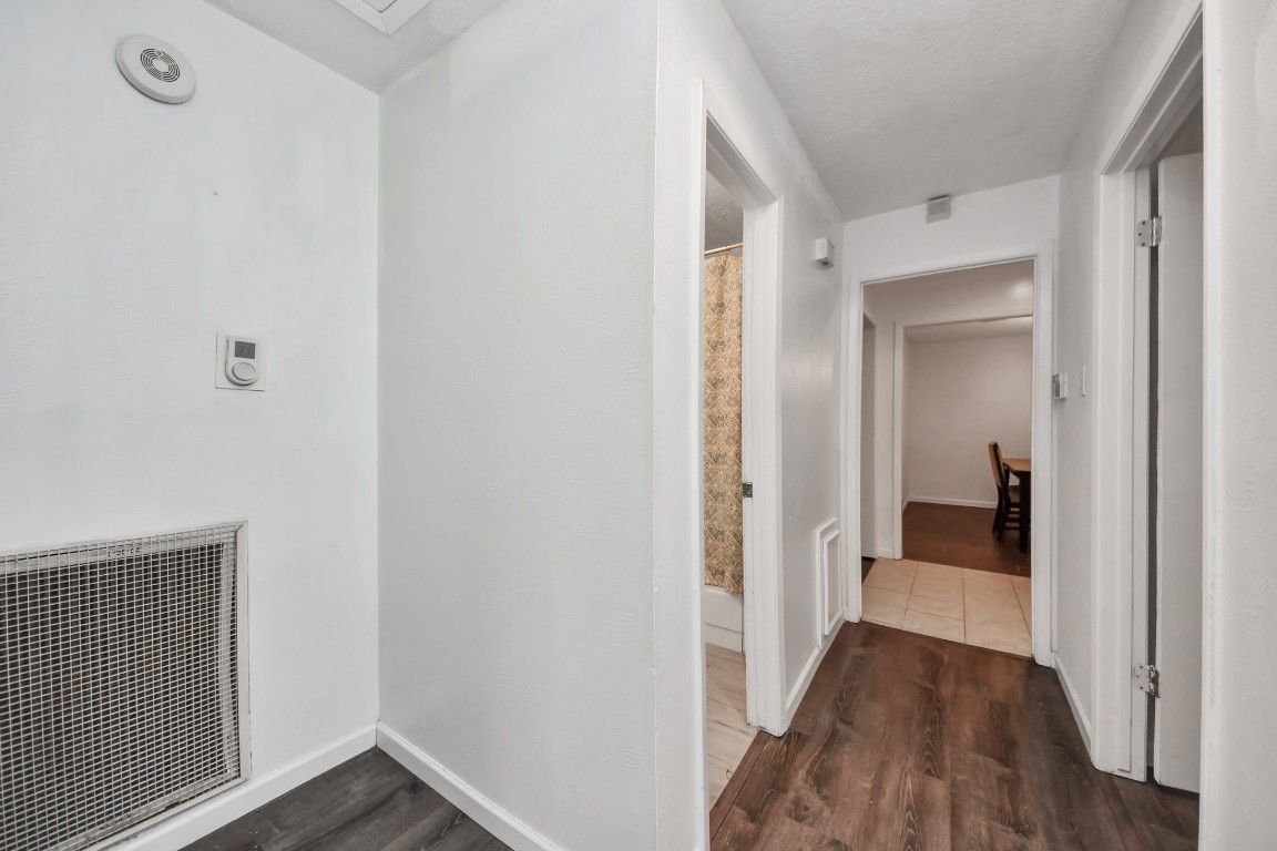 1415 Parry-Sound Pasadena, TX 77504 - Photo 33 of 39 a view of a hallway with wooden floor