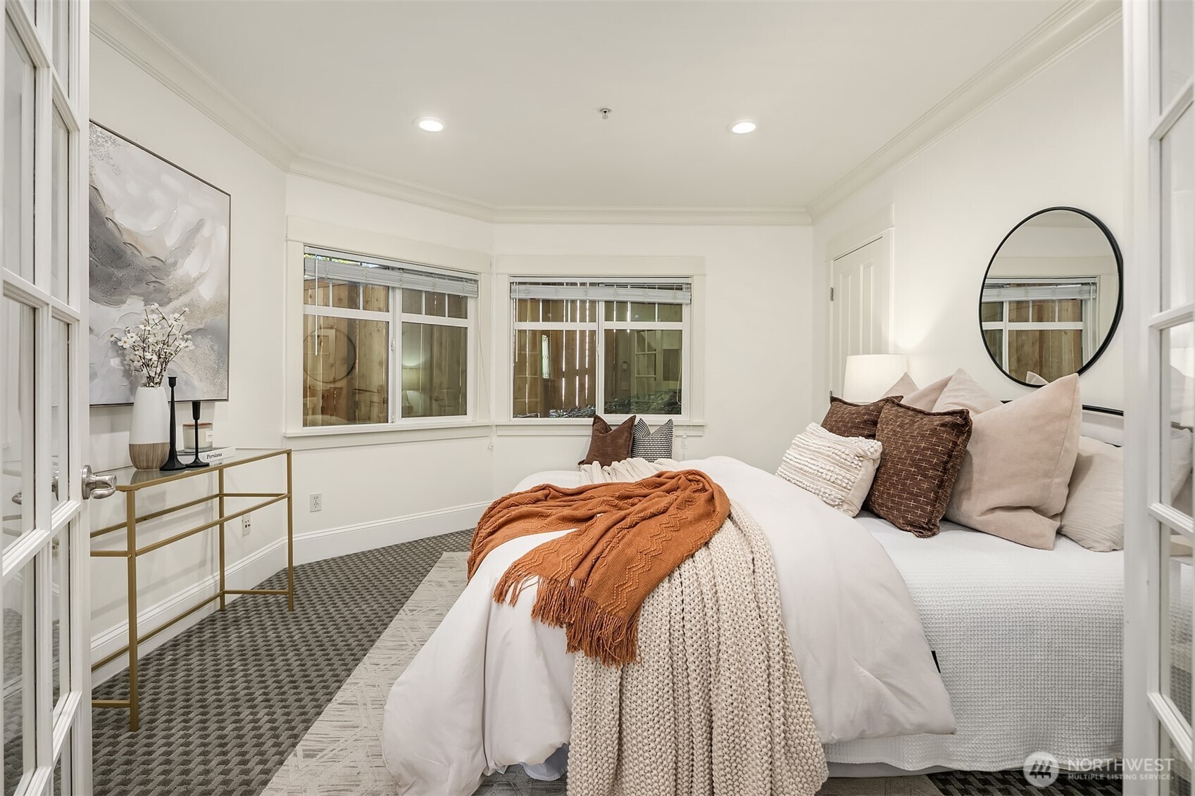 1206 East Republican Street Seattle, WA 98102 - Photo 15 of 27 a bedroom with a bed and a large window