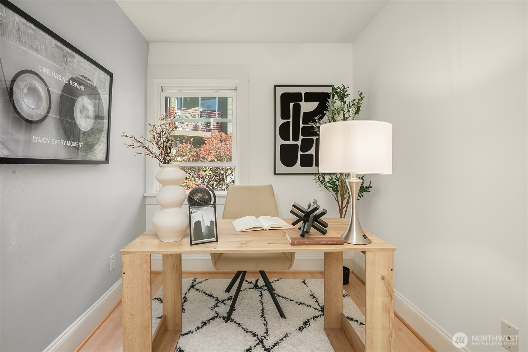 1206 East Republican Street Seattle, WA 98102 - Photo 18 of 27 a living room with furniture and a window