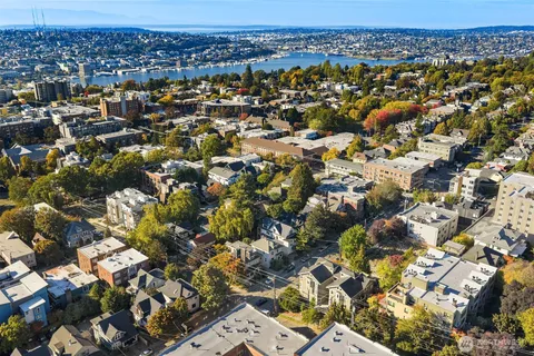 an aerial view of residential building with parking space