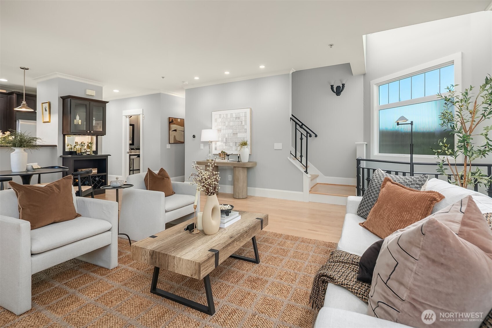 1206 East Republican Street Seattle, WA 98102 - Photo 3 of 27 a living room with furniture and a wooden floor