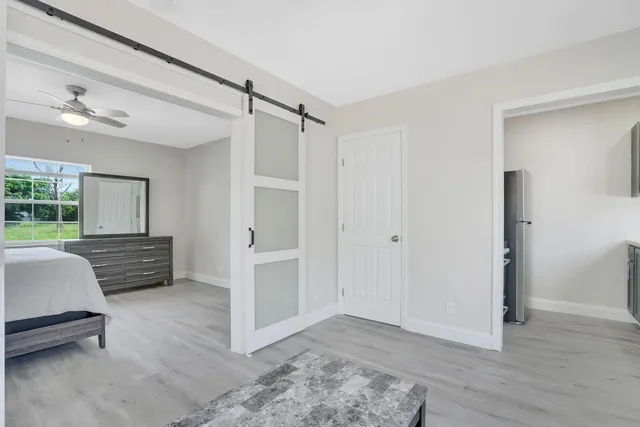 a view of an empty room with a window